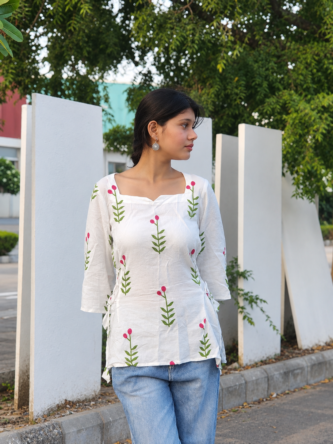 White Floral-Print Cotton kurti with green leaves, pink buds, and side tie-up detailing
