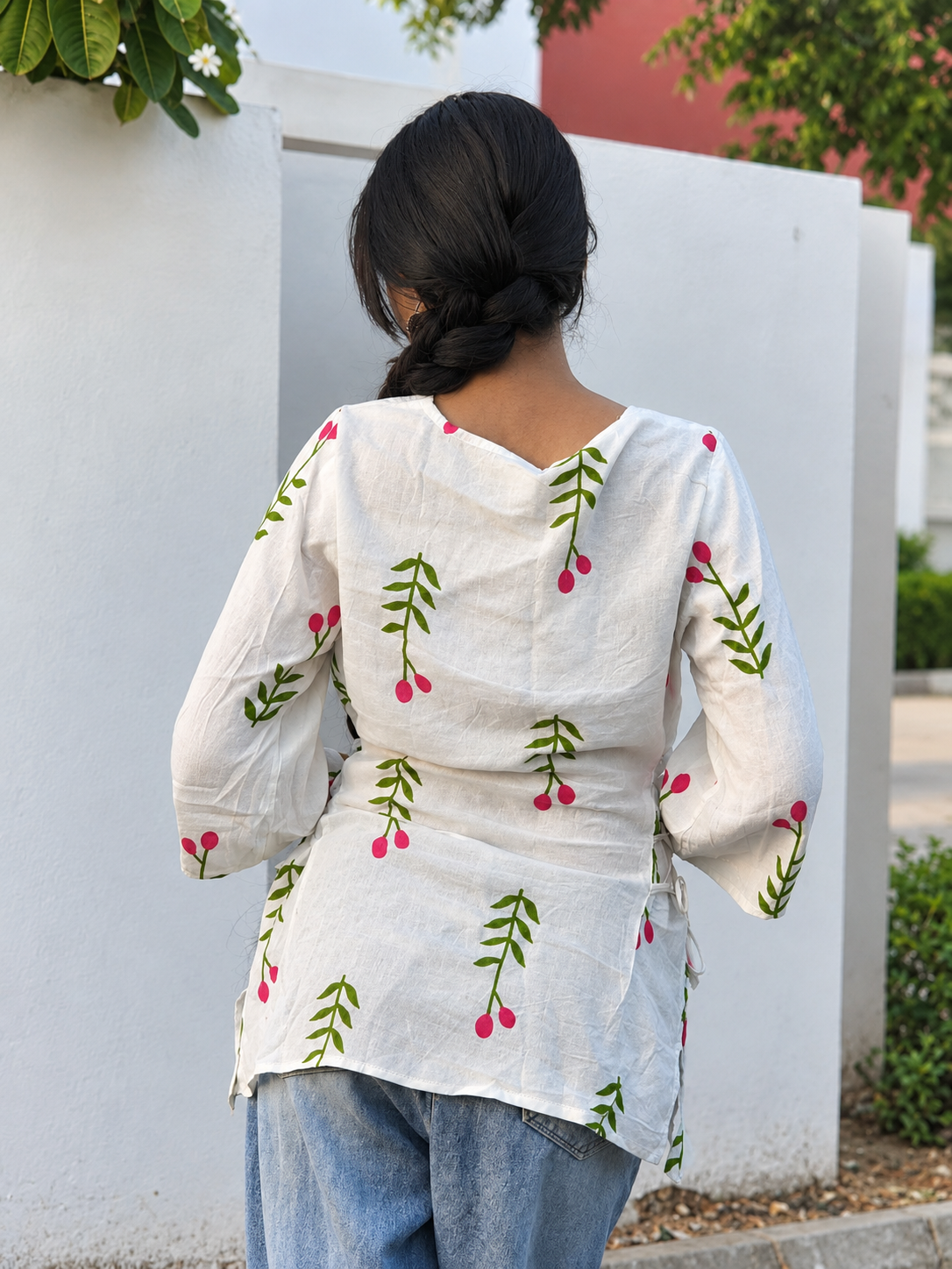 White Floral-Print Cotton kurti with green leaves, pink buds, and side tie-up detailing