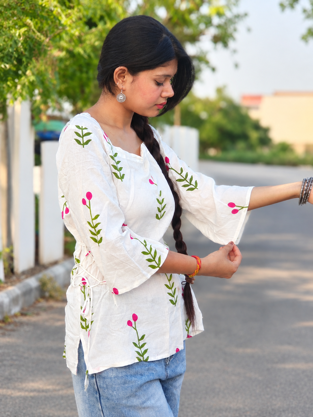 White Floral-Print Cotton kurti with green leaves, pink buds, and side tie-up detailing